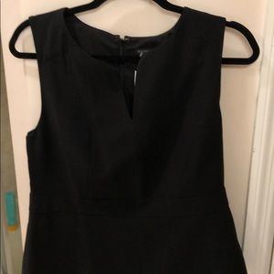 Black sleeveless peplum top